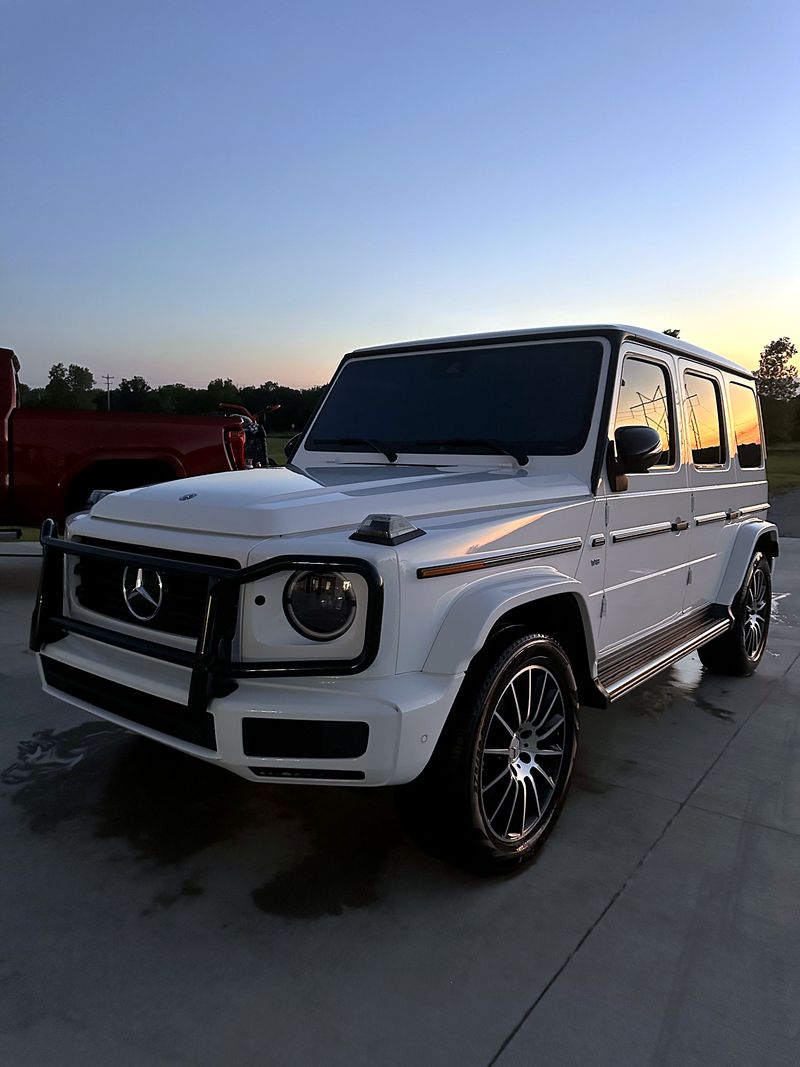 White Mercedes G-Wagon at sunset